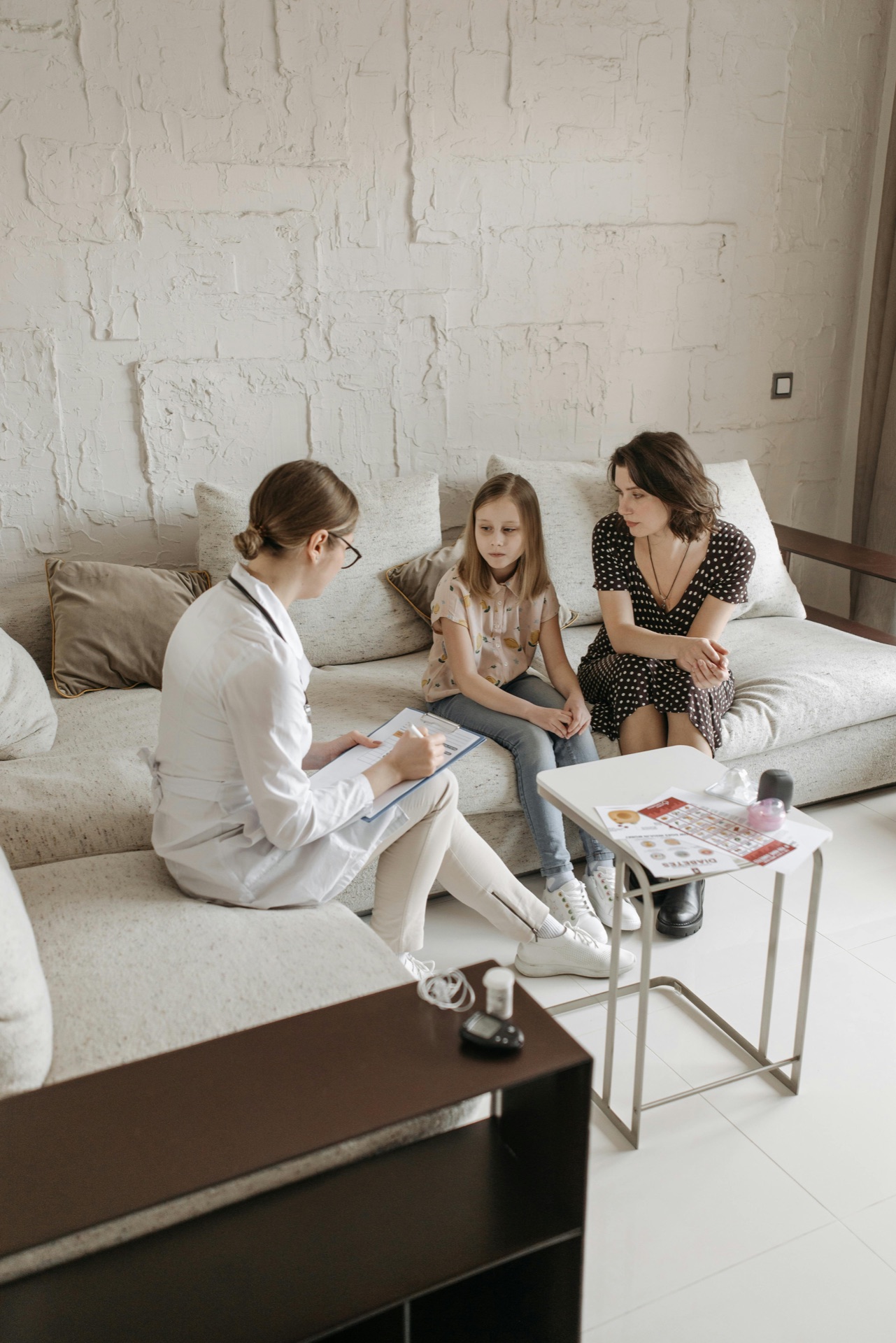 Family therapy session with children and parents